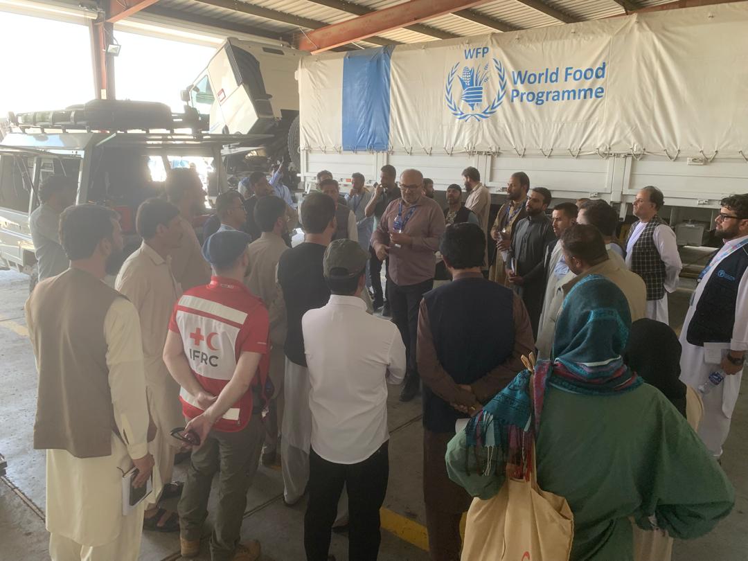 Inside the warehouse during the Afghanistan LWG WFP Warehouse Visit 2025