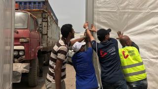 Four participants set up a MSU as part of a training in Yemen