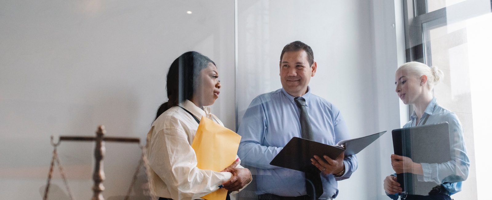 Colleagues chatting at work
