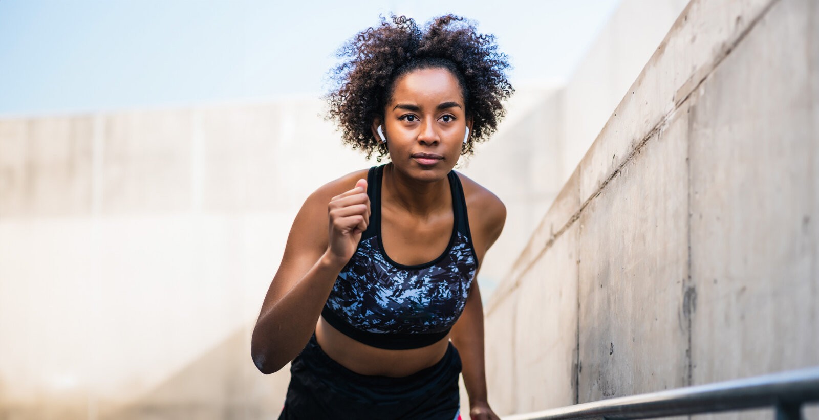 A black woman runing via Shutterstock