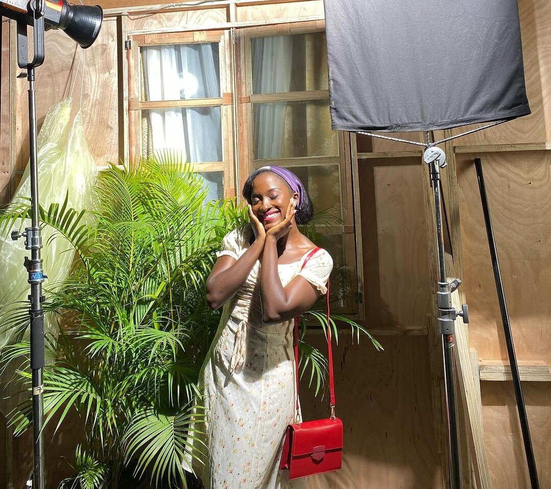 Genoveva in floral midi dress on the set of Breath of Life