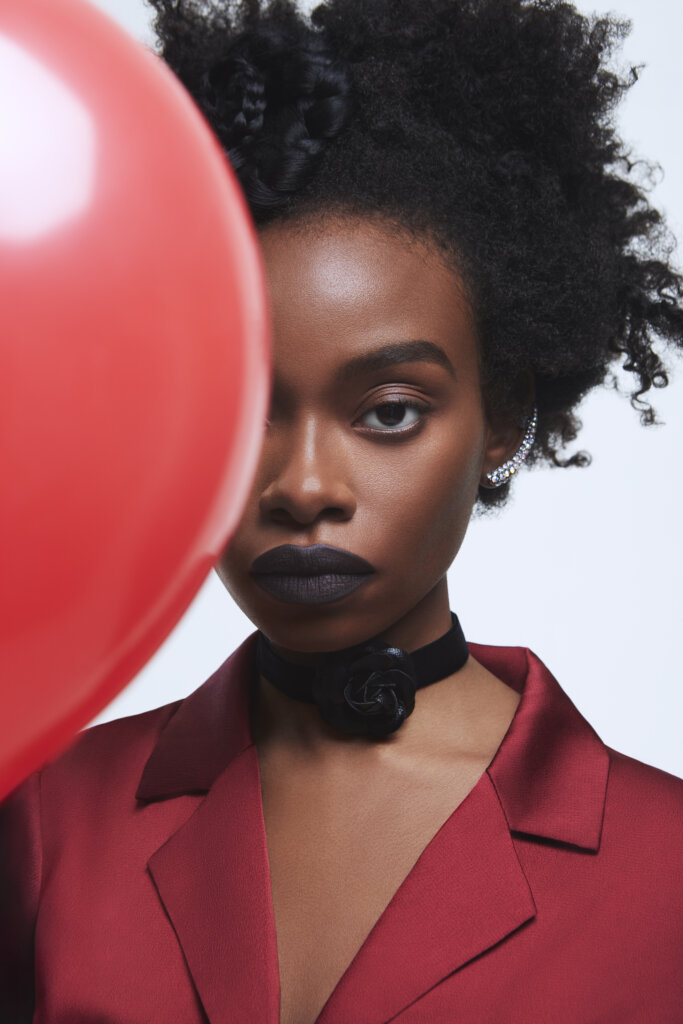 Clowncore | Rebel CircusRed Blouse: Sugar + Lips Black Rose Choker Necklace: Melrose and Market Paired with vintage diamond ear cuff