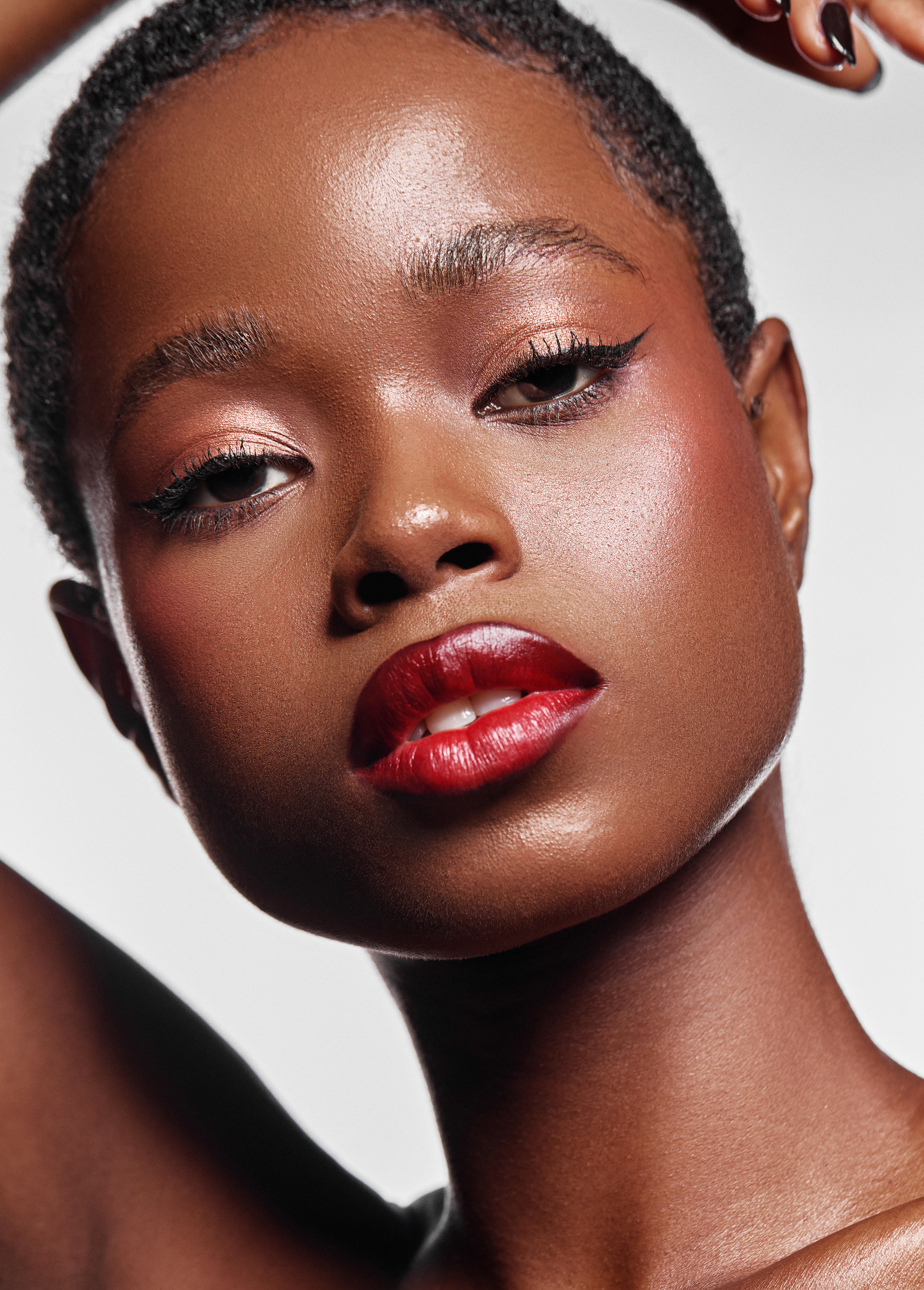 Joy Akhigbe in minimal festive makeup by House of Daffodil for Chanel via Marie Claire Nigeria