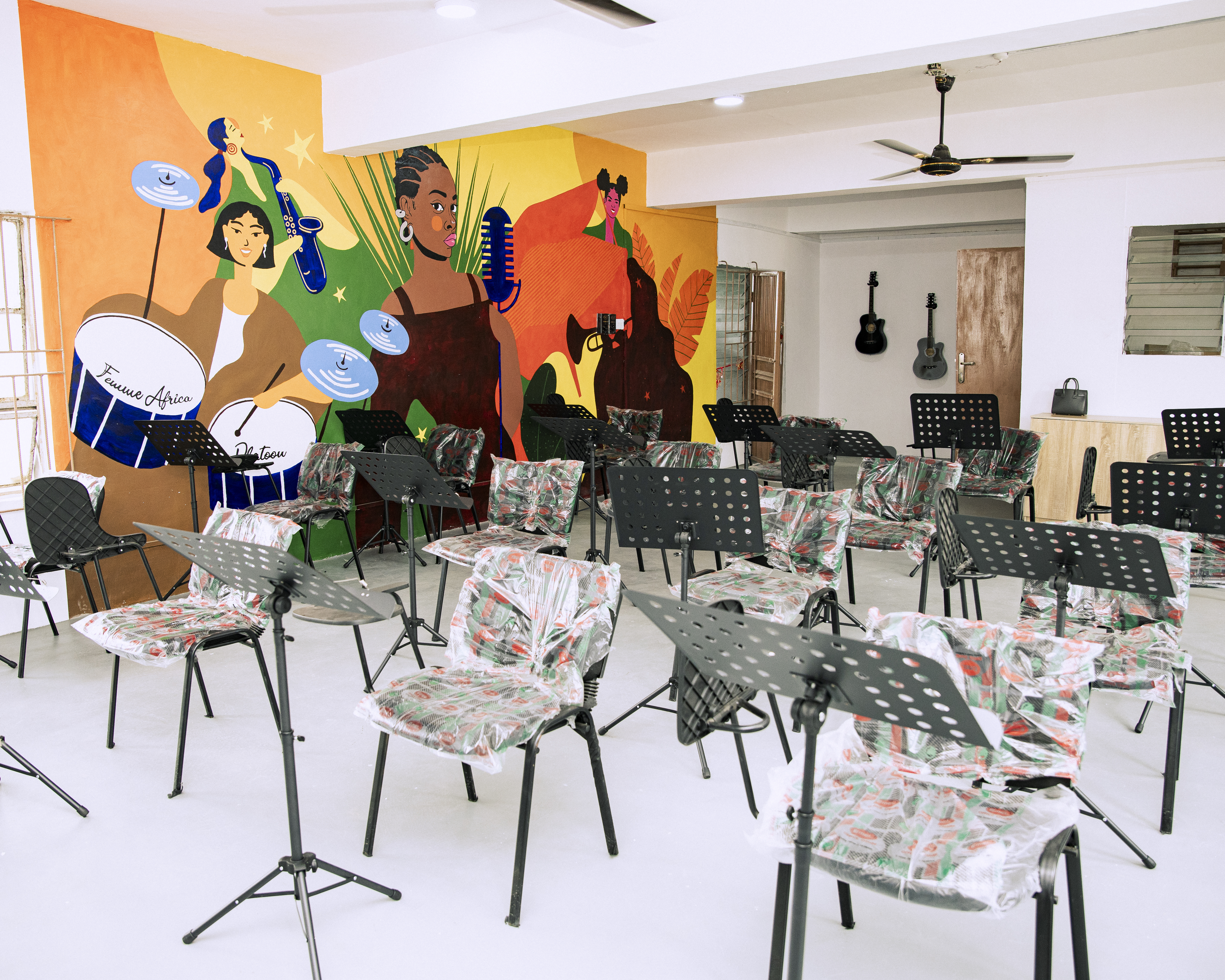 The newly refurbished music room at Queen's College Lagos via Femme Africa