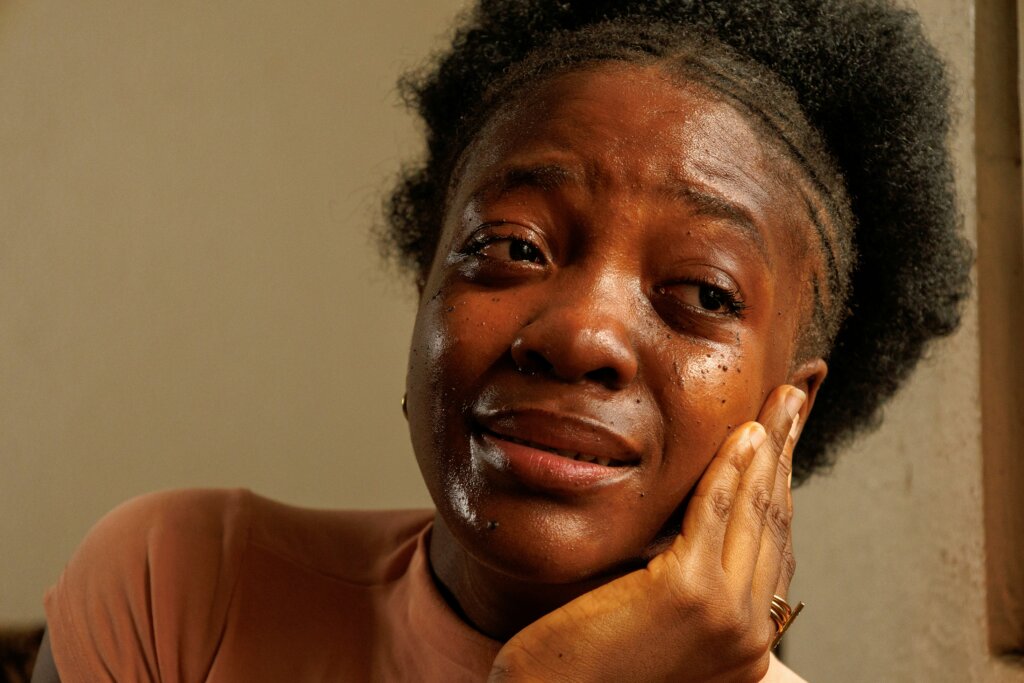 Woman in tears by Ben Iwara via Unsplash
