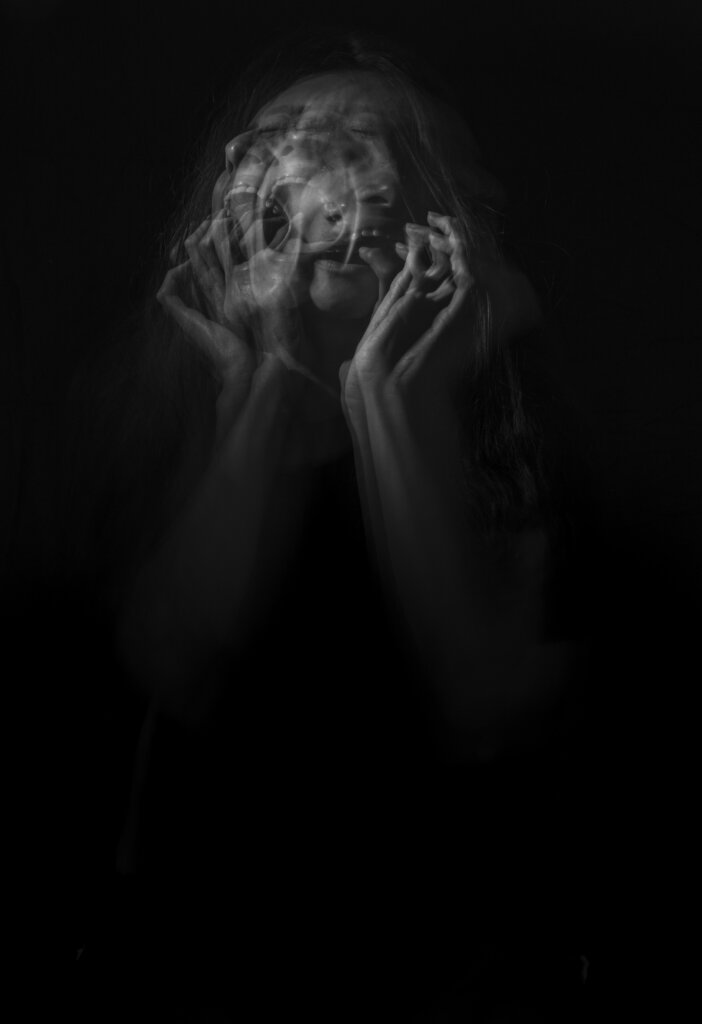 A double exposure shot of a person screaming by Camila Quintero Franco via Unsplash+