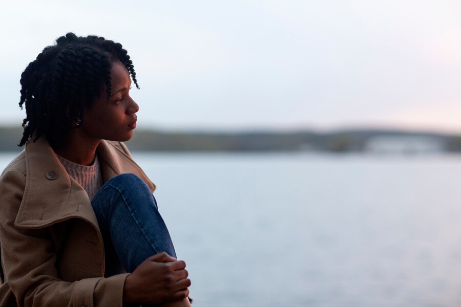 Woman in a solemn mood via Freepik