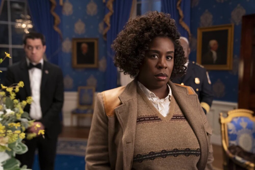 Uzo Aduba in an earthy look with edgy silhouettes on the set of The Residence, shared via NBC.com