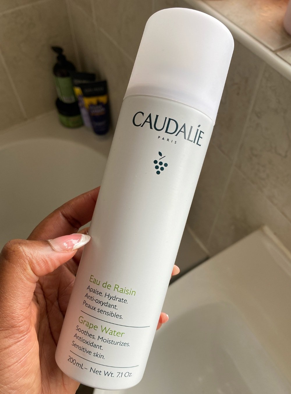 Hydrating products for vacation - Caudalie Grape Water face mist via blissfulessence.com