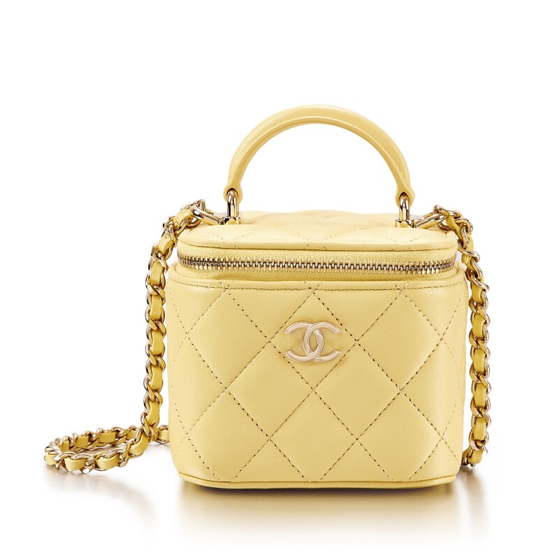 Chanel lambskin quilted mini vanity case bag with gold hardware in yellow via sothebys.com