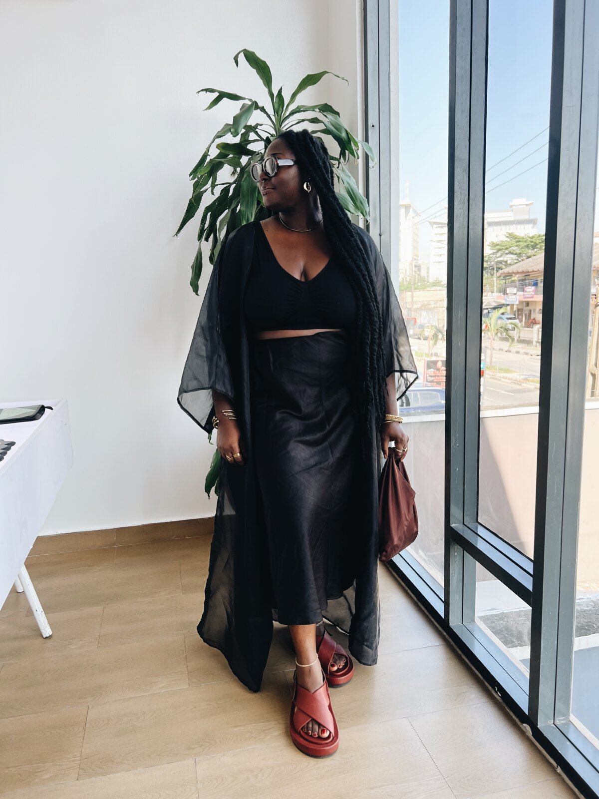 Marie Claire Nigeria’s Content Editor in an all-black comfortable fit by Tobi Afolabi