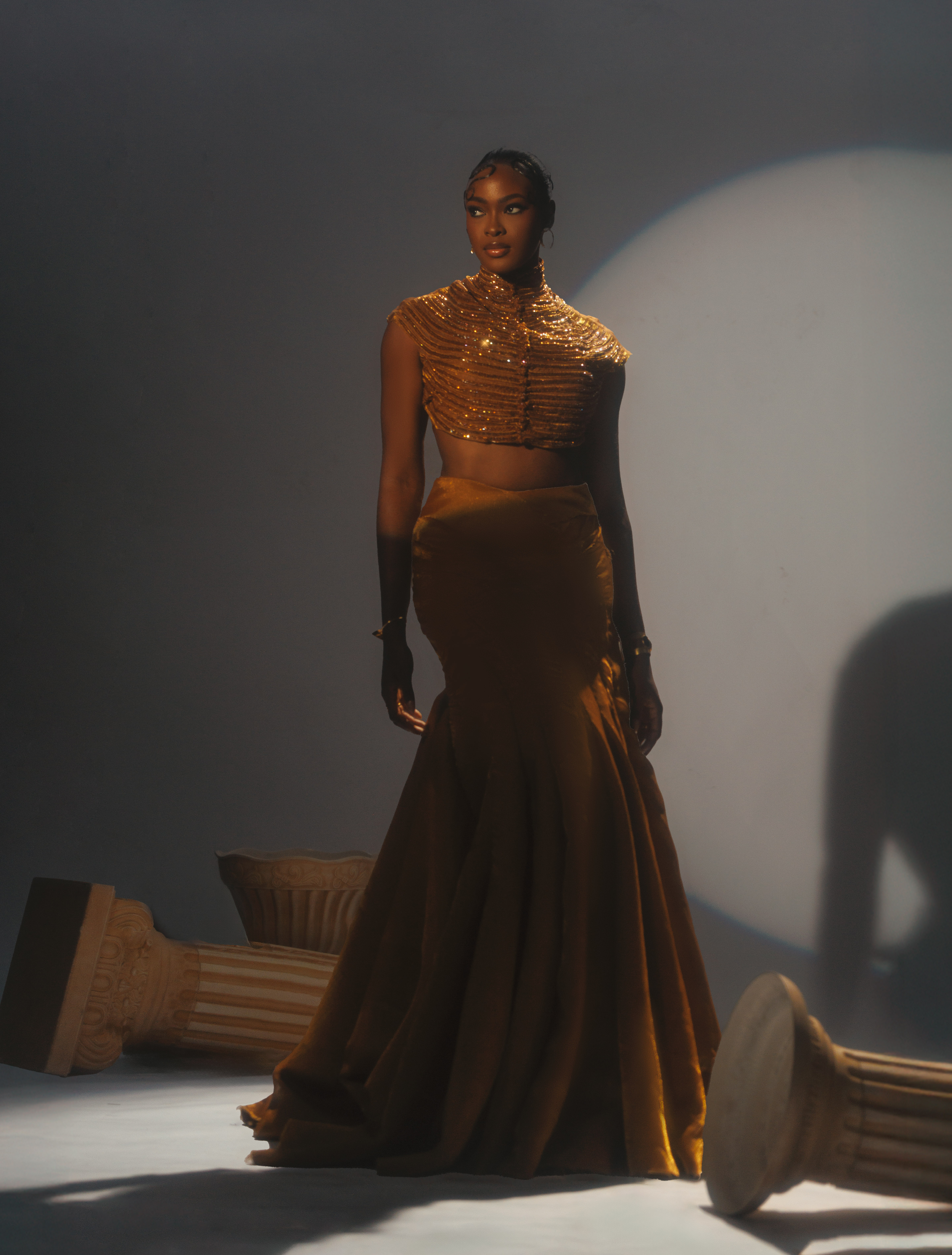 Angel Anosike’s AMVCA debut look in a stunning two-piece beaded top and flowing skirt set by Yemi Shoyemi. Hair by Bernard Smiles. Makeup by Make up by Tejj. Image by Lasalvy