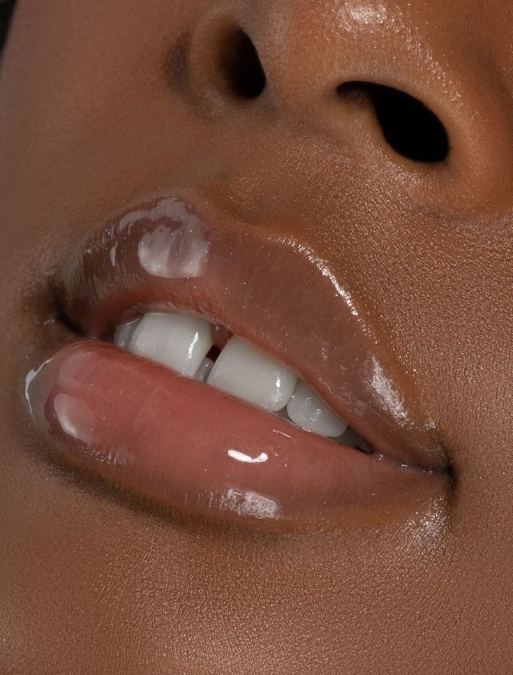 Black woman’s well-glossed lips via Carynthian on Pinterest (original creator unknown, if this is your work, please contact us for credit)