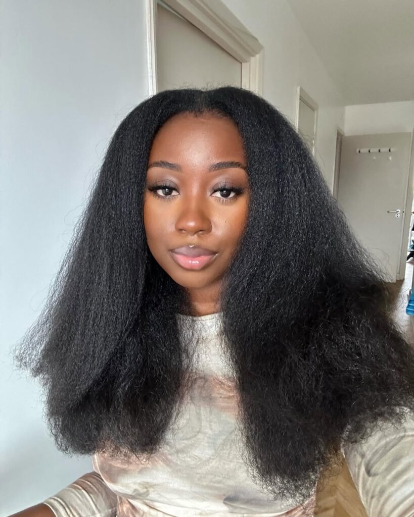 Rachel Akua showing off her natural hair in a full, voluminous blowout via @rachelakua on Instagram