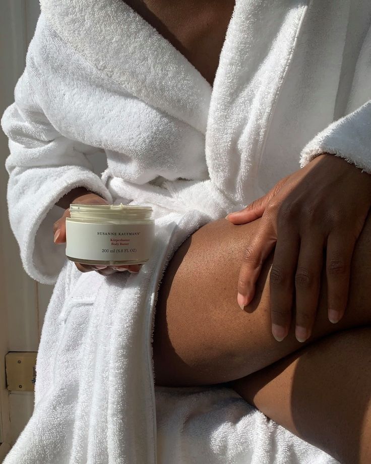 Model holding body butter via Susanne Kaufmann on Pinterest