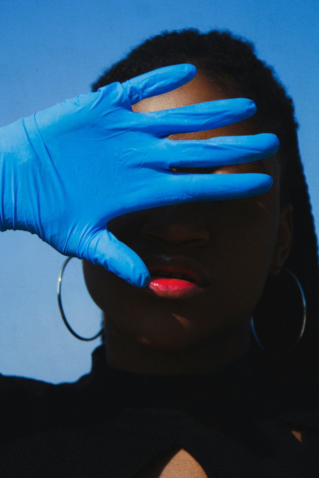 My beauty confessions - Image of woman wearing gloves by Ben Iwara via Unsplash