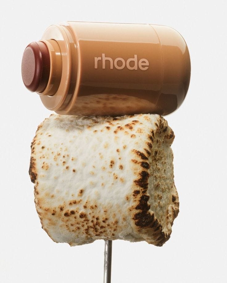 Rhode blush balanced on top of a mashmallow