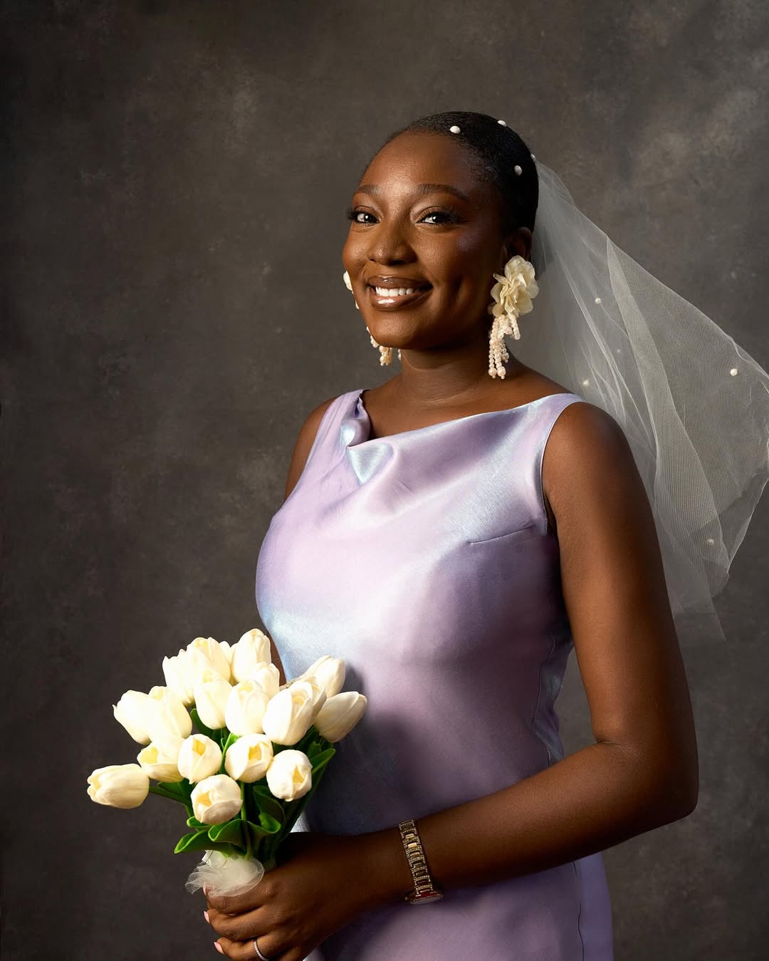 Wumi Tuase-Fosudo in minimal makeup for her civil wedding. Makeup by House of Daffodil. Photo by The Kunle Akin