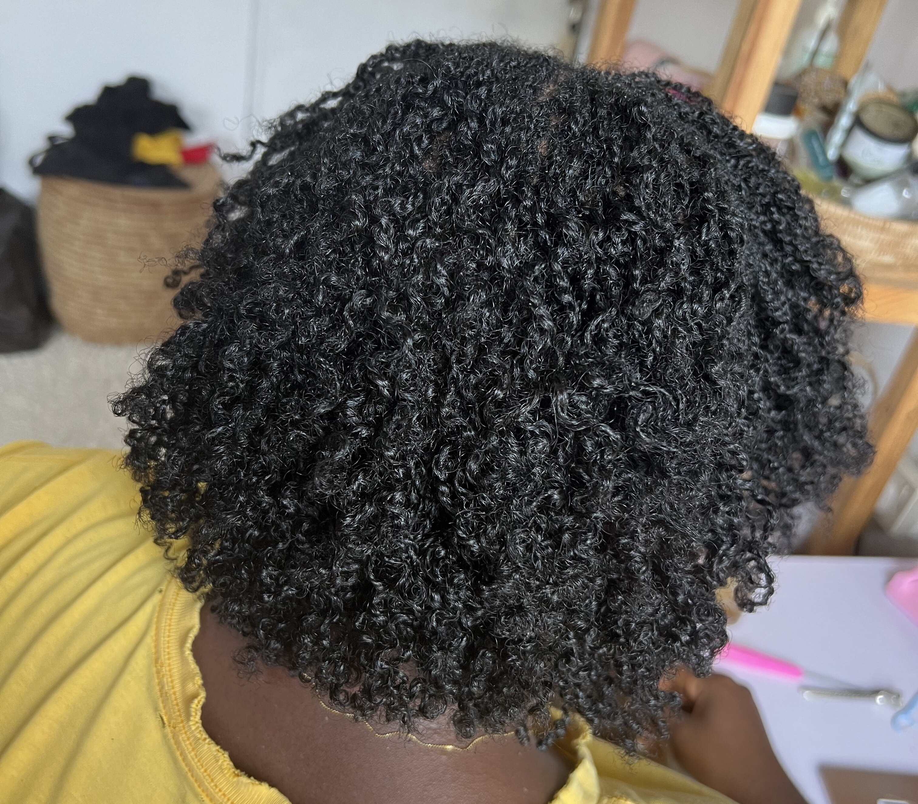 A picture of Tobi Afolabi’s locs, one month into her loc journey. 