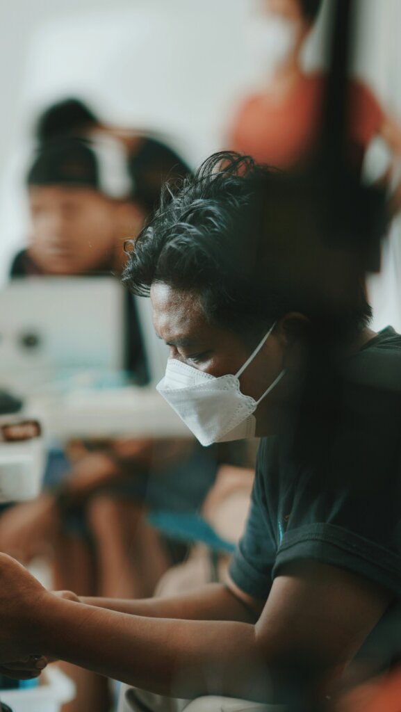 Woman with a face mask at a hospital