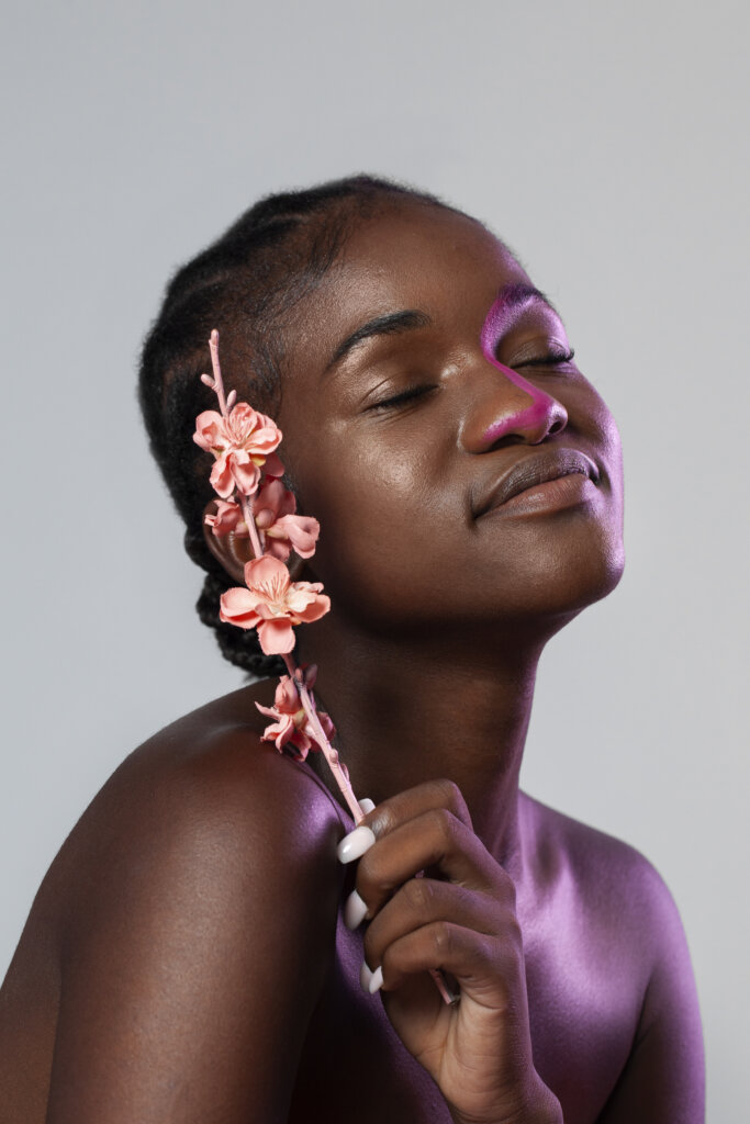 Black woman with healthy skin via Freepik