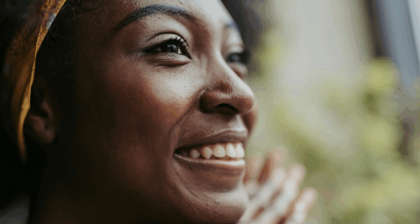 Intelligent people; a smiling black woman by Getty Images via Unsplash