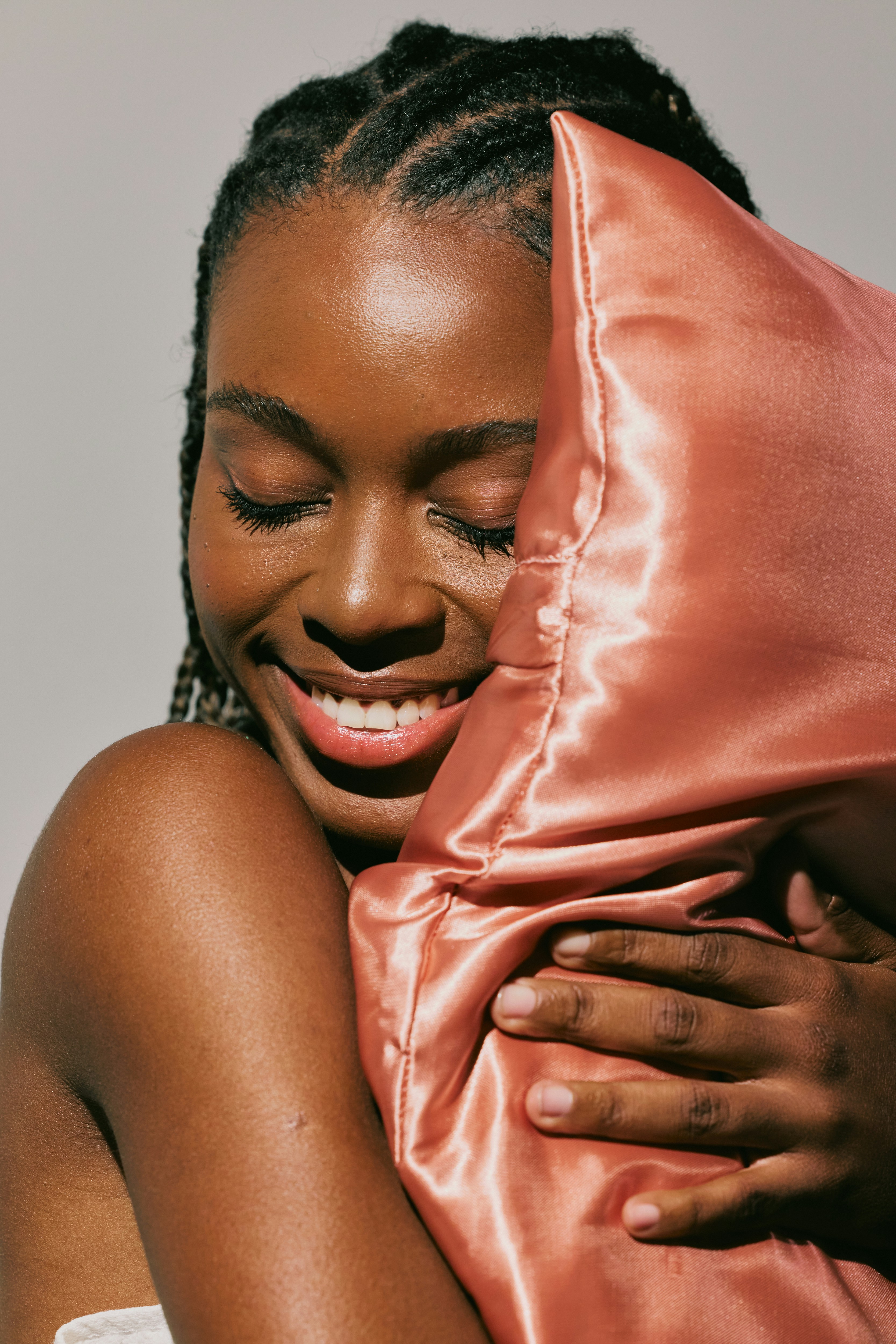 A black woman wearing a silk bonnet via Natalia Blauth