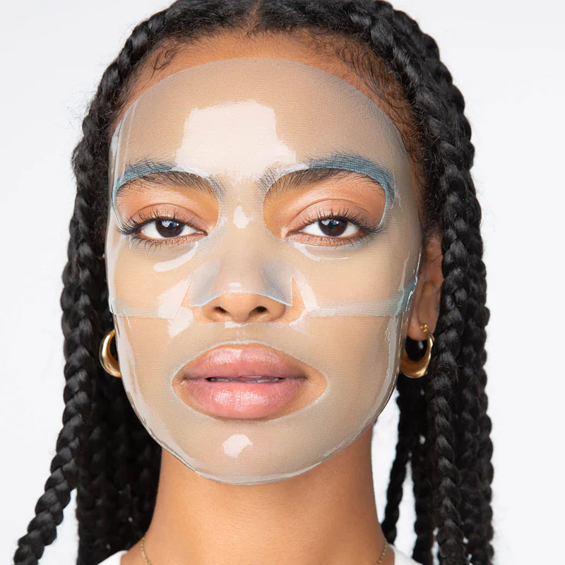 A black woman wearing a hydrogel mask via Loopsbeauty.com