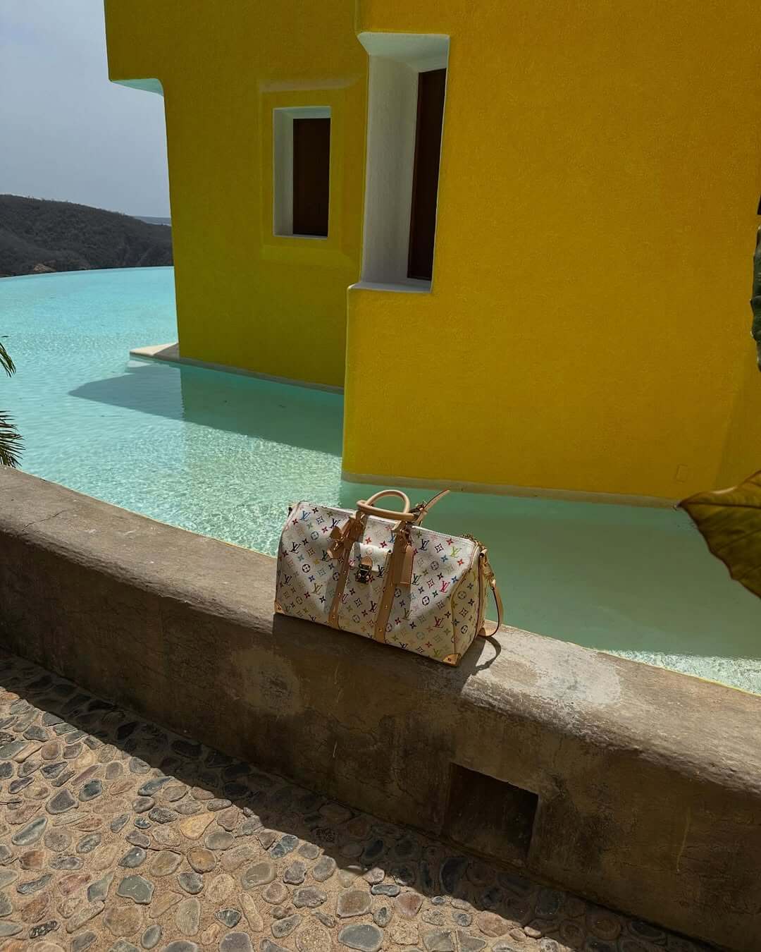 How to pack like a pro- LV x TM Keepall Bandoulière 45 via Fisayo Longe on Instagram