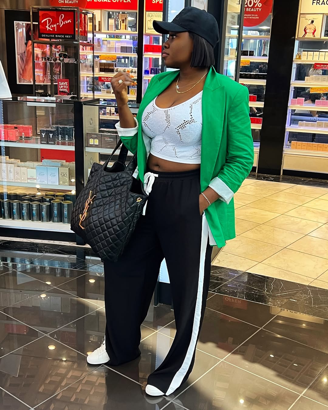 Airport style - Bims wearing a green blazer by Zara. Pants by ASOS. Footwear by Gucci via @bimsfashionmuse on Instagram.