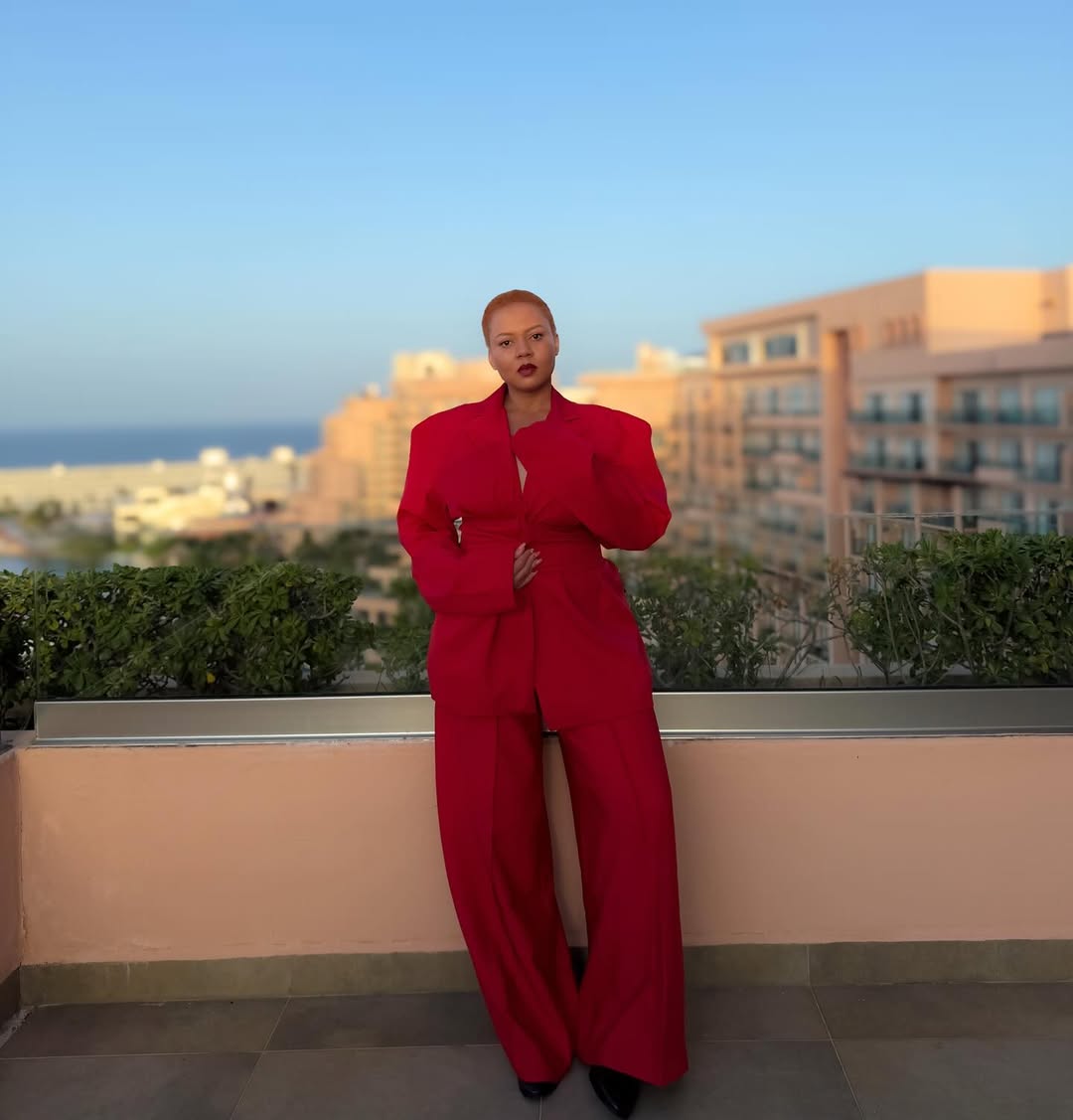 Mariam Bakre in a red two-piece by @theankoshop via @mory_coco on Instagram.