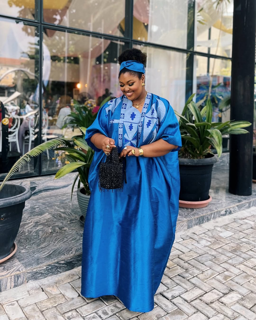 Denise Eseimokumoh in a blue kaftan from @xamiras_ via @theloliaba on Instagram