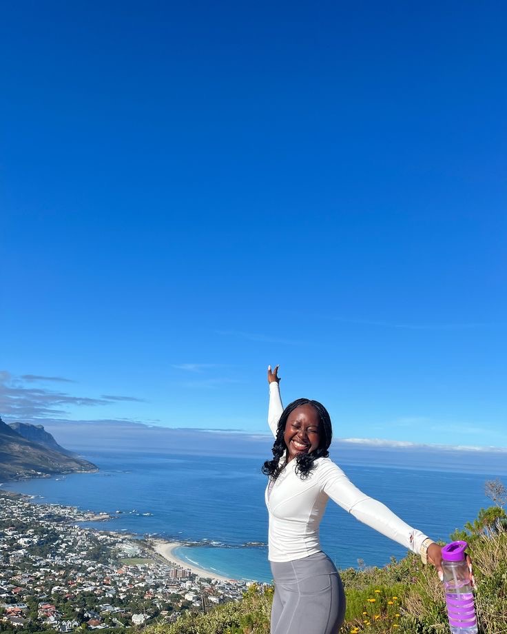 Black woman at the top of a hill in Cape Town, South Africa via @Chiko Malango via Pinterest