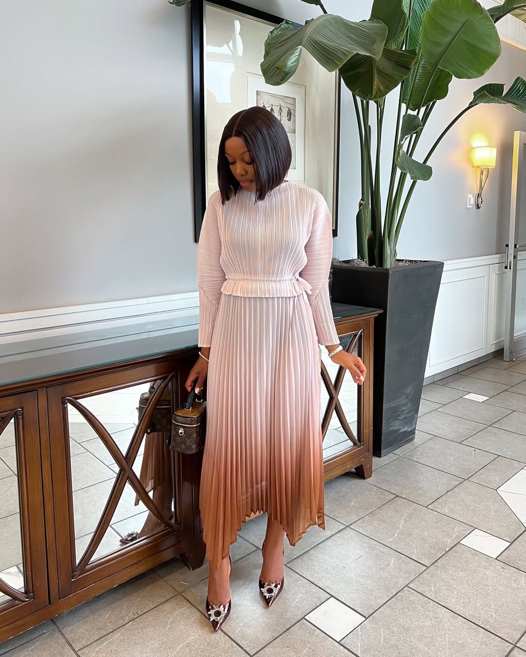 Alexandria wearing the Aminda Pavo dress in nude via @tostos_ on Instagram