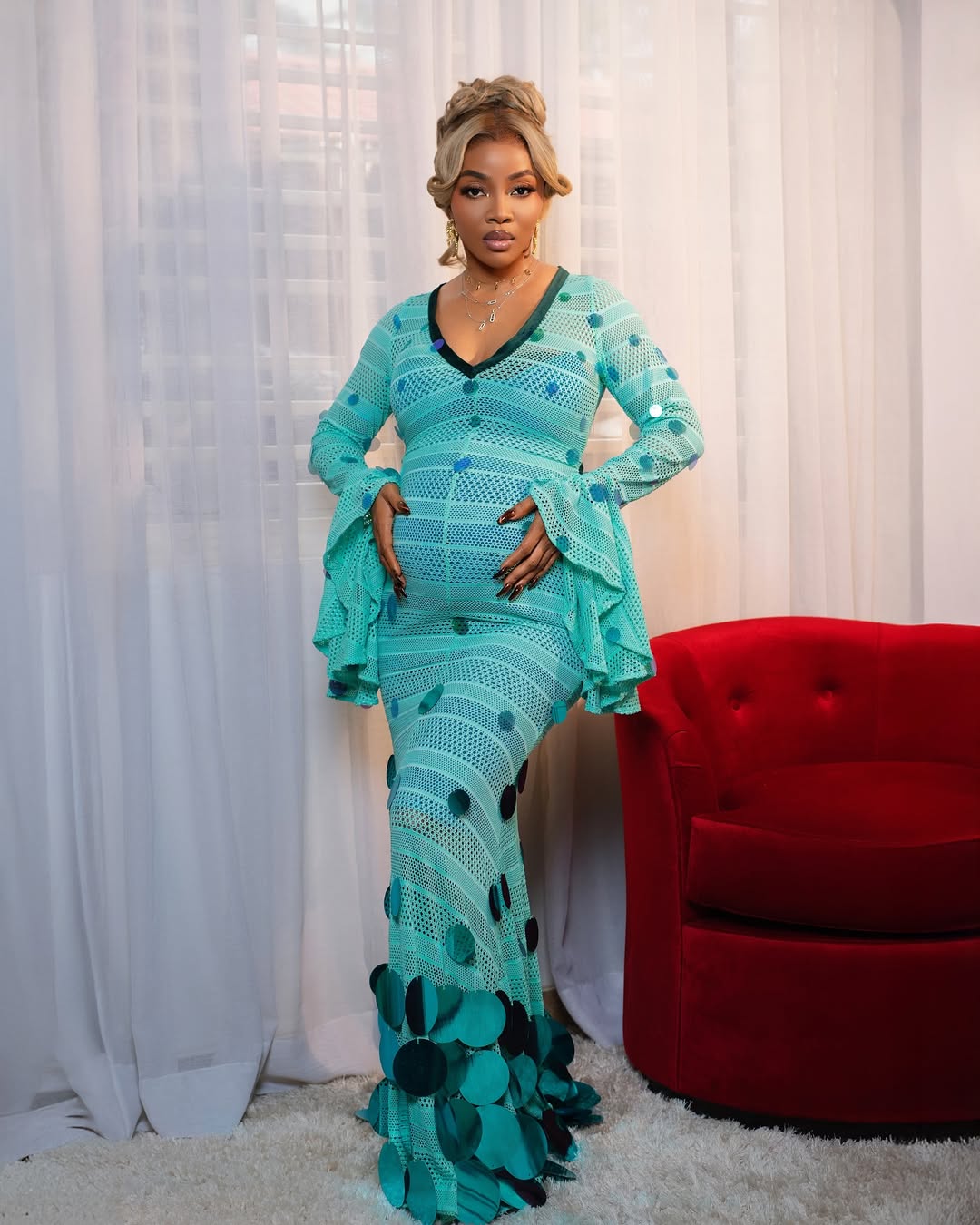 Pregnancy fashion - Toke Makinwa in LáLé Ethereal sequin knit dress in mint via @tokemakinwa on Instagram