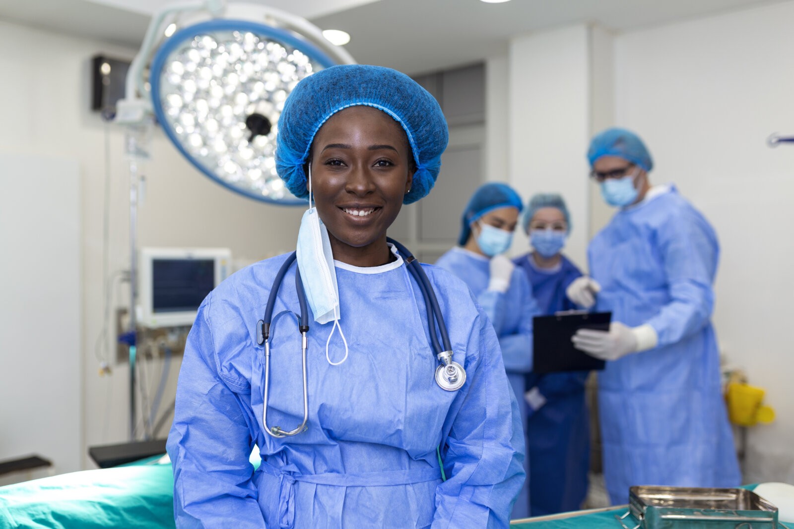 Black female doctor in an operating room by Stefamerpik via Freepik