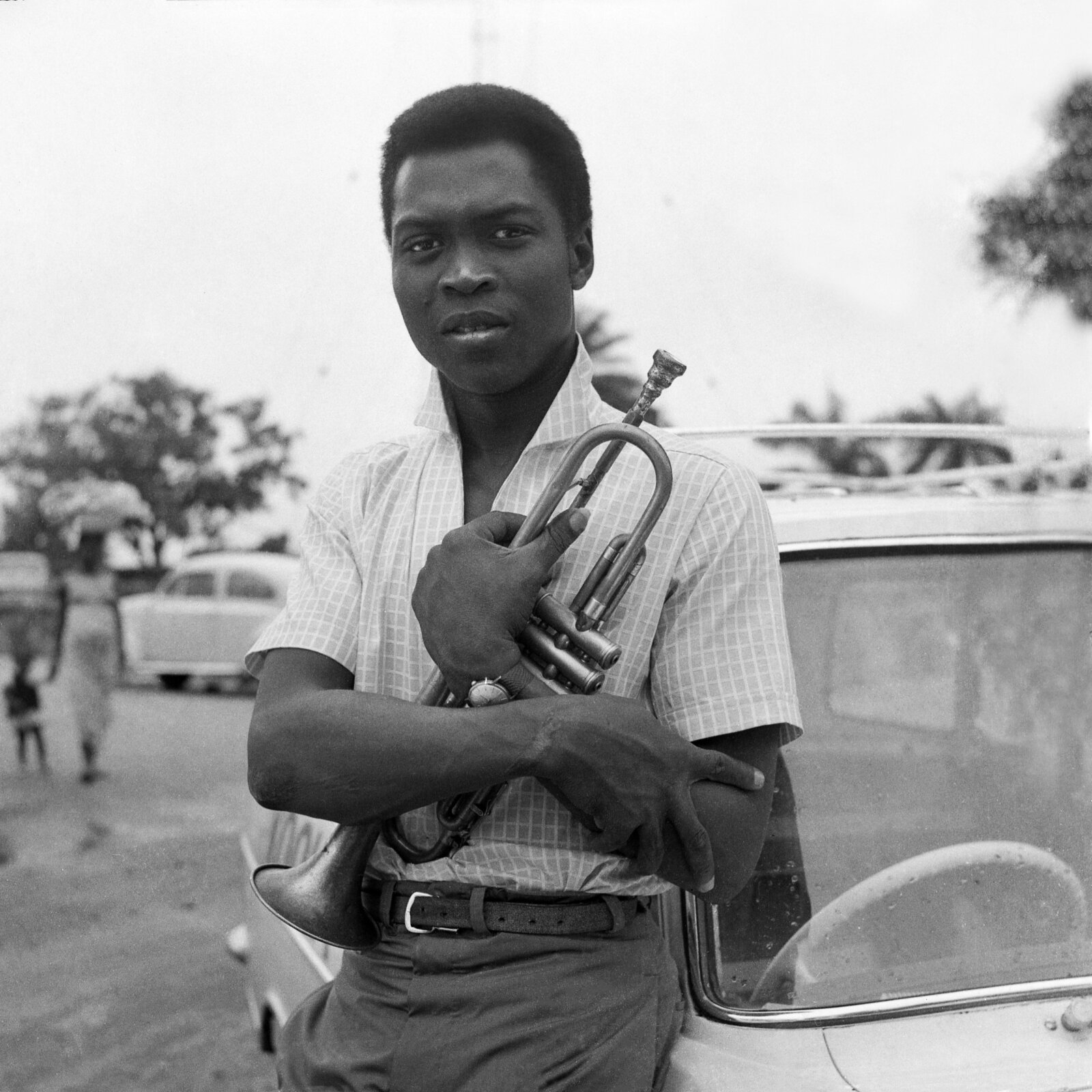 Fela Kuti holding a musical instrument by Tola Odukoya 1966 via Fola PR