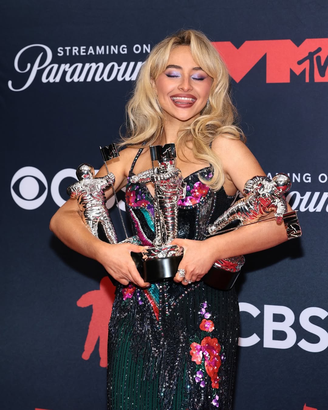Sabrina Carpenter poses with her awards at the2025 VMAs via @mtv on Instagram