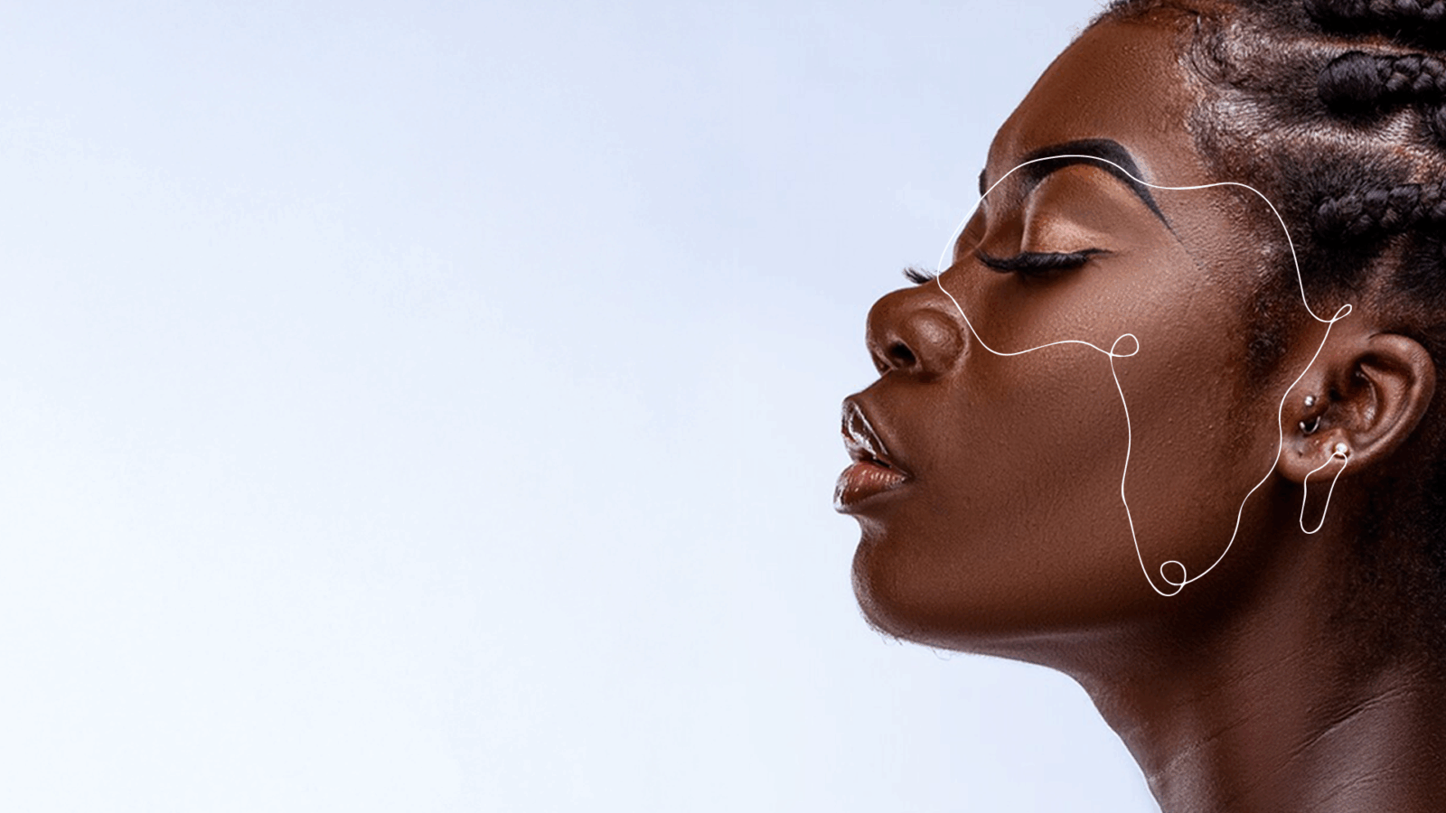 A woman with the map of Africa on her face via Lux Afrique