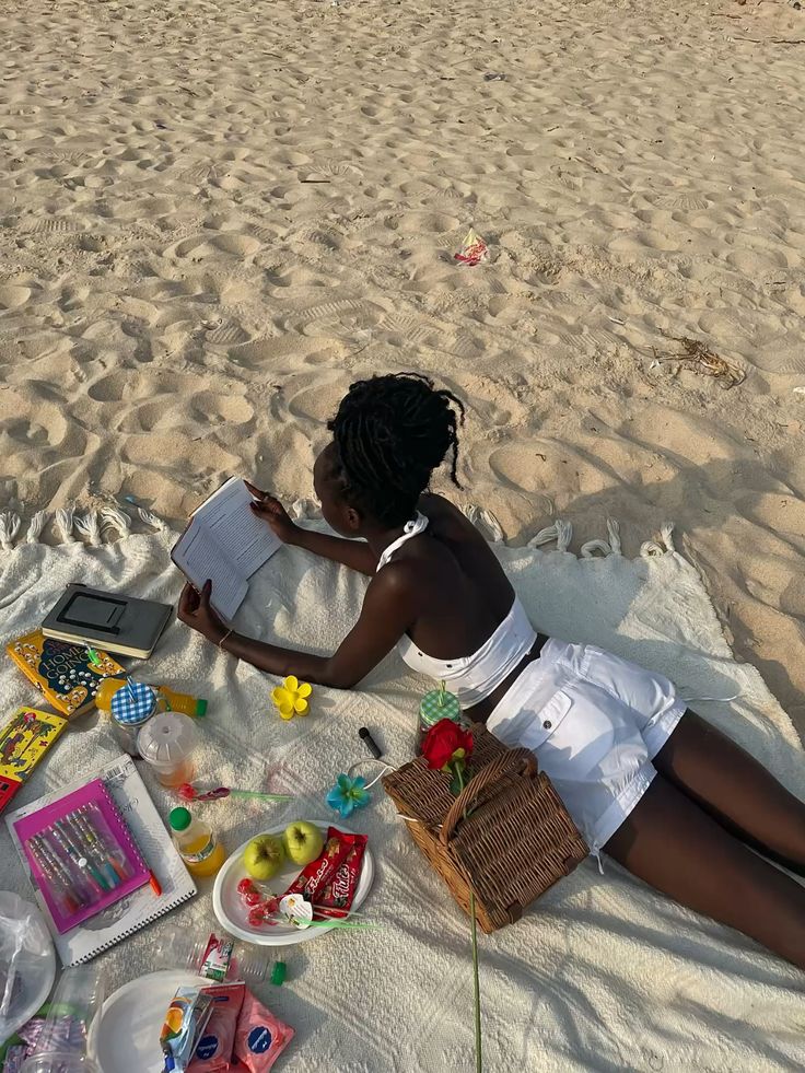 Black woman lying down at the Beach by Dera via Pinterest women