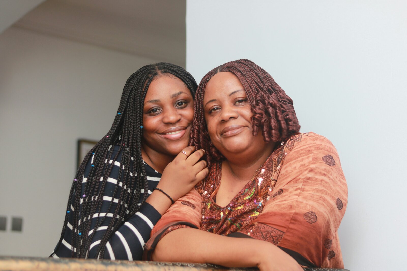 Mother's sacrifice; a mother and daughter by Gabriel Ogulu via Unsplash