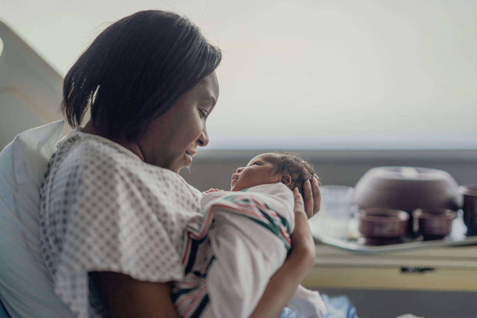 Postpartum skincare for mother & child - Mother and her newborn by Getty Images via Unsplash