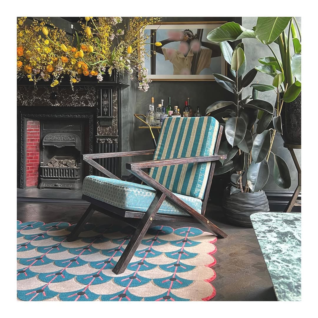 Photograph of Ilè Ilá chair design in an aesthetic space by Ilè Ilá via @ile.ila on Instagram