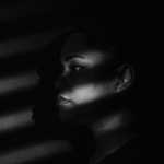 A portrait of a Black woman via Unsplash.