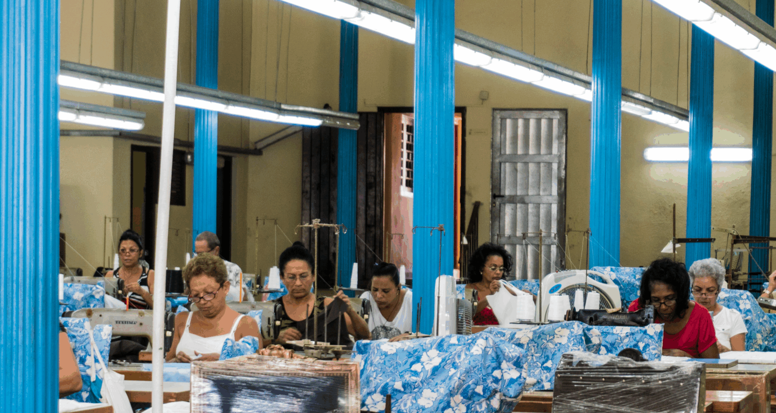 Women sewing via Allan Wadsworth via Unsplash