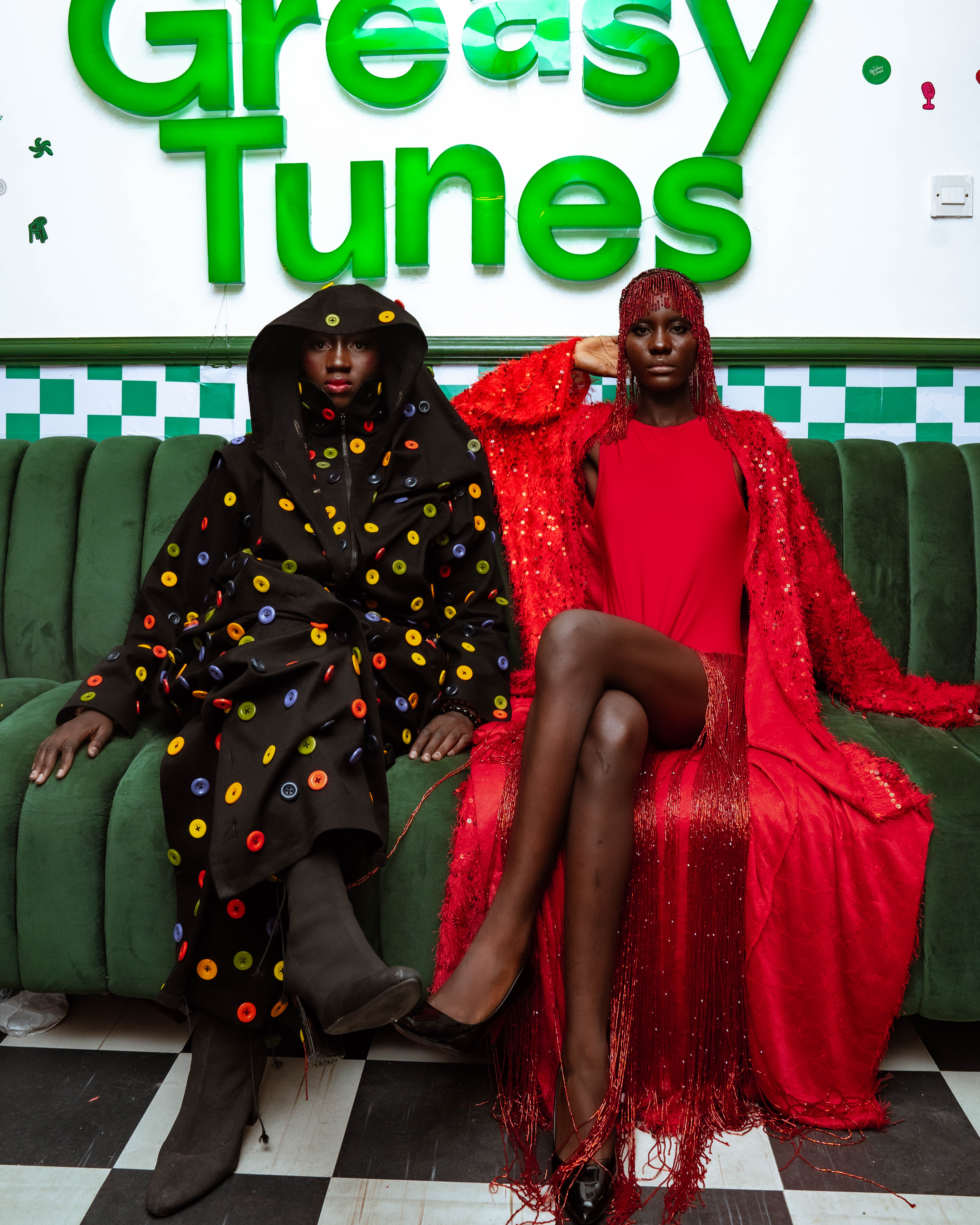 Models posing at the Afrobeats Culture in Motion by Severe Nature x Spotify