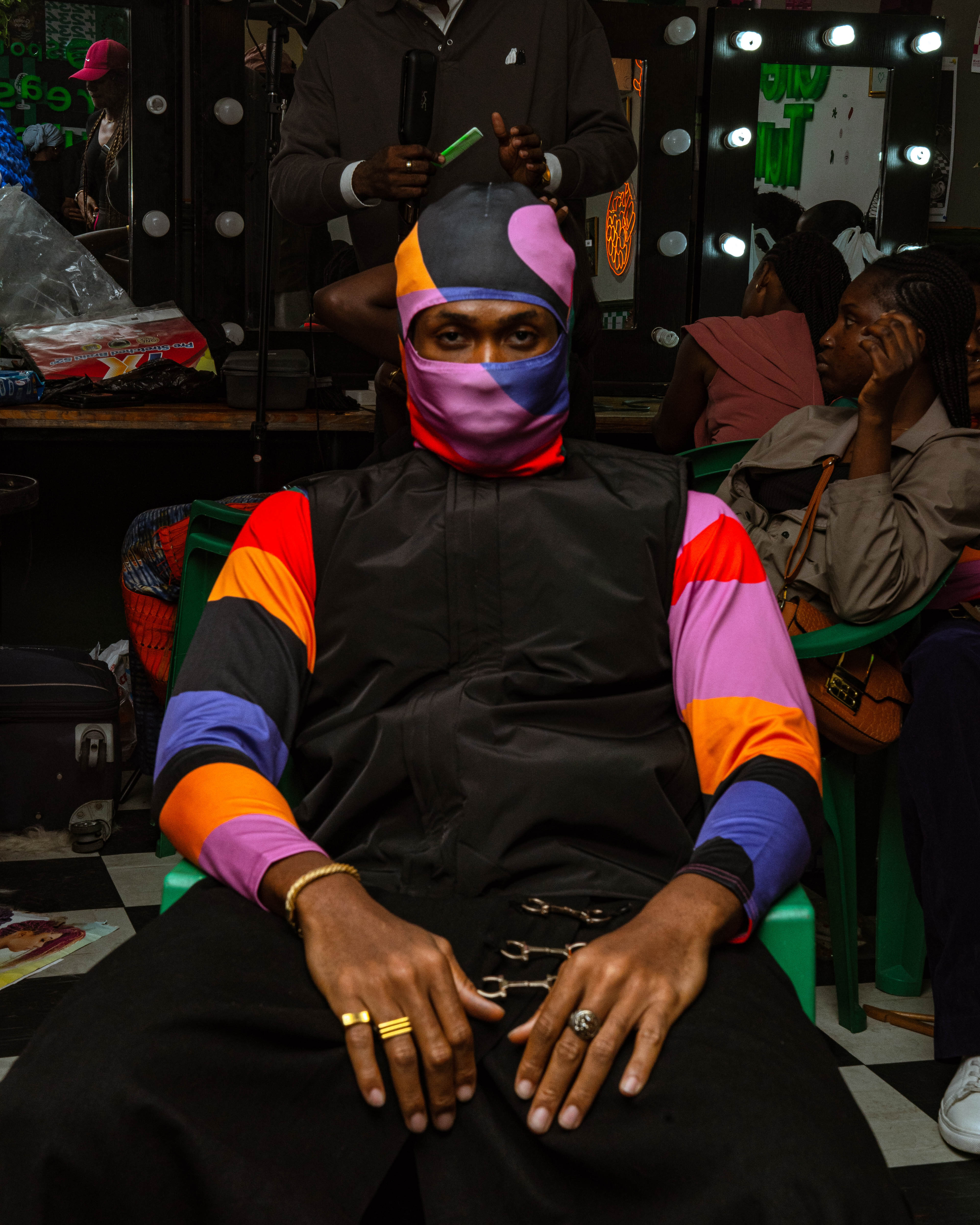 Model posing at the Afrobeats Culture in Motion by Severe Nature x Spotify