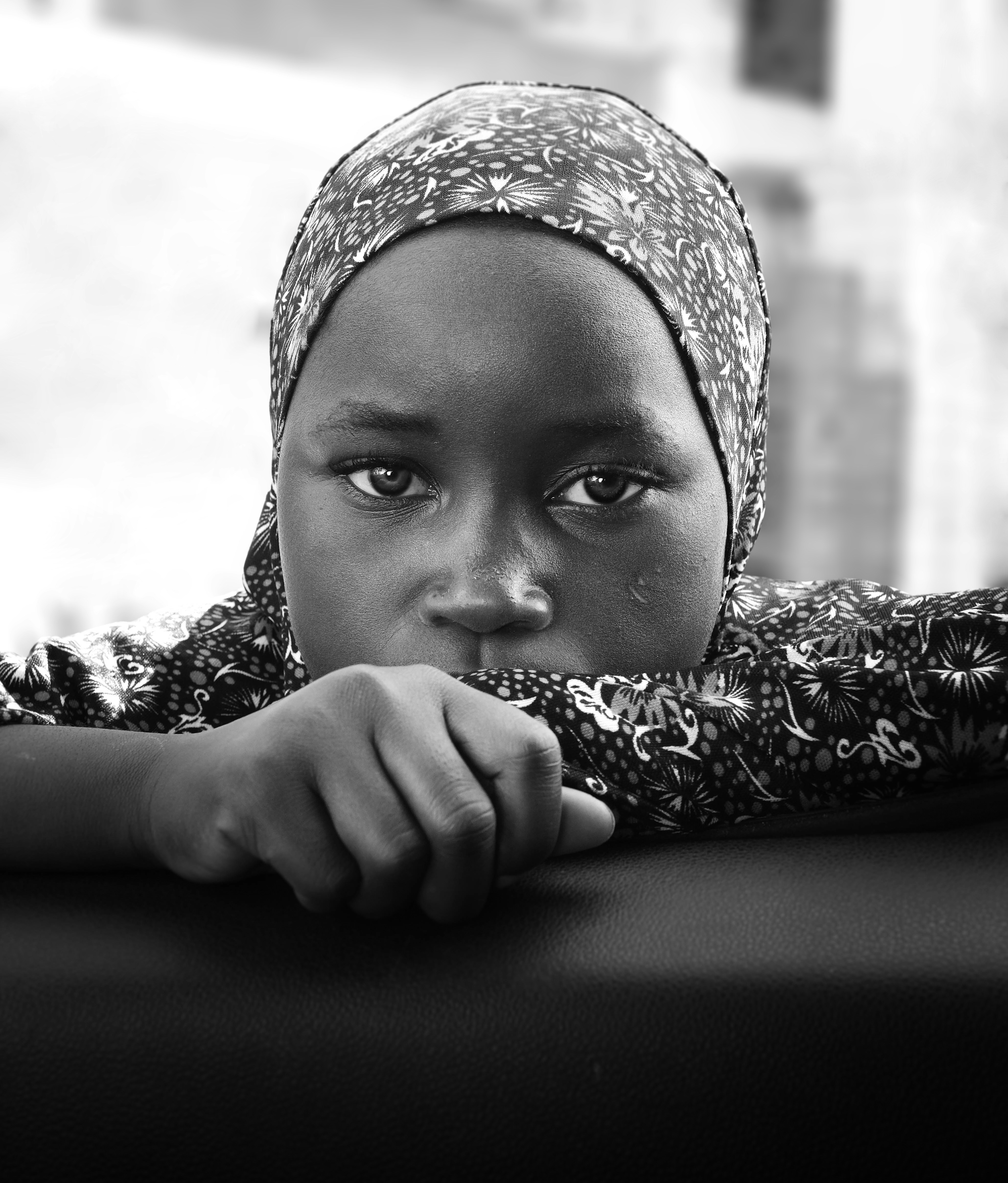  A black girl wearing a hijab by Islam Fersaoui via Unsplash 
