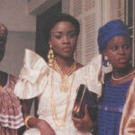 Old photo of four women wearing traditional attires via Pinterest