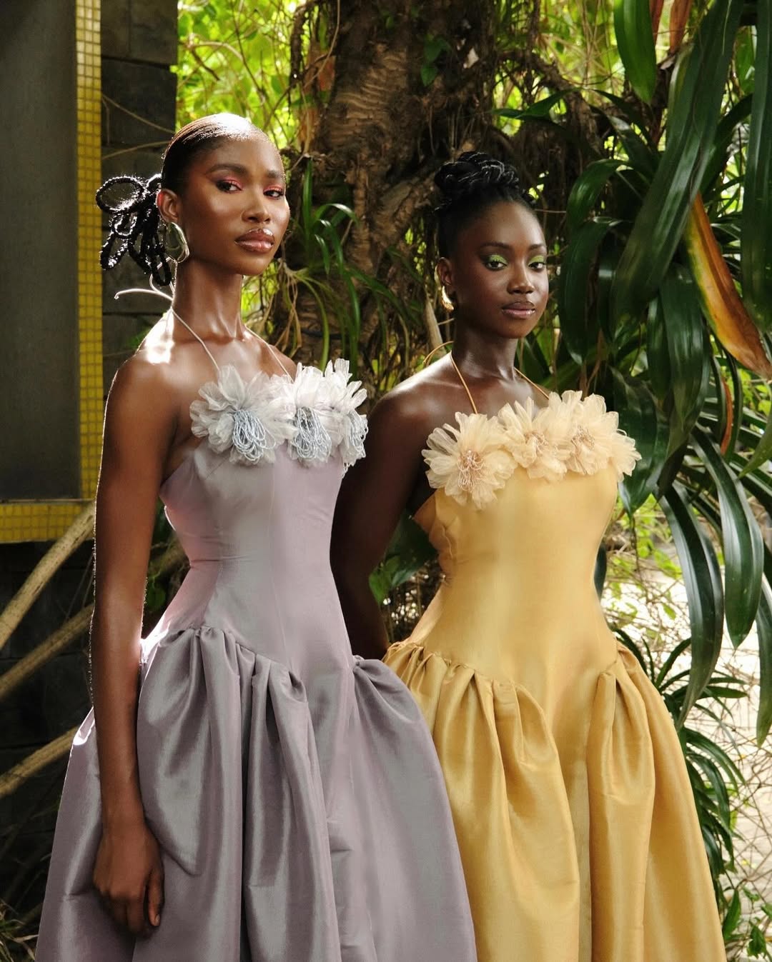  Models in the DESIRÉE IYAM Grey and Gold Fuchsia Midi dresses